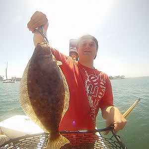 SKIFF FISHING IN NEWPORT HARBOR BAY CATCHING SAND BASS, HALIBUT, BAY BASS, AND BAT RAY