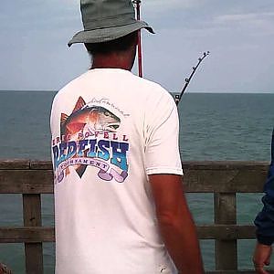 7-28-13 Tim Chavez catching a 23.5 Pound King Mackerel off Seaview Fishing Pier