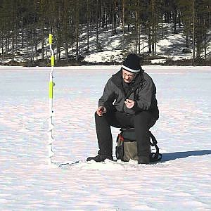 Ice Fishing Norway. Isfiske finnskogen