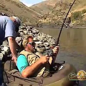 Gigantic Sturgeon in an Inner tube-Babe Winkelman